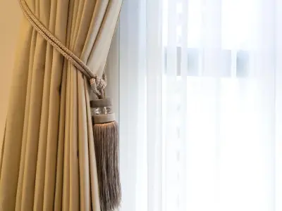 Detailed view of the intricate weave pattern on sheer curtains